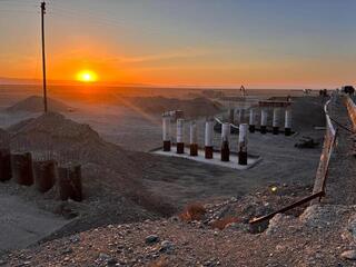 В Аксуатском районе ведется строительство моста, который соединит три села